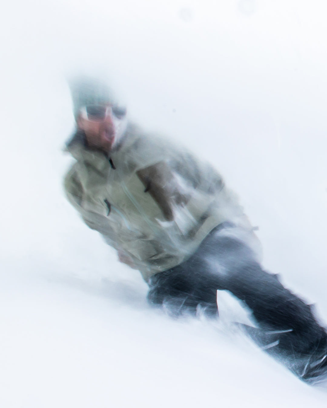 Snowboarder close-up riding in powder with Bataleon Snowboards 2025/2026