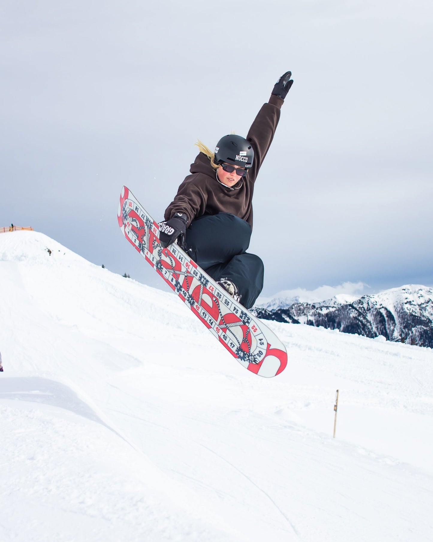 Quality women snowboard in red and white. Moodboard 2025 | Bataleon Snowboards™ 2025.